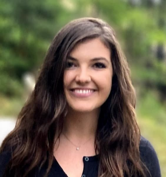 Adult young woman smiling looking at the camera
