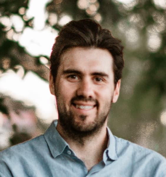 Adult white man smiling looking at the camera